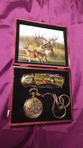 Knife  and pocket watch set in a wood box with deer scenery on knife and watch
