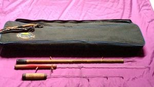 Vintage ice fishing sticks and stick bag