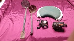 2 fishing reels, bucket seat, and 2 fishing scoops ( 1 with chisel on end)