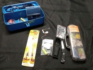Metal tackle box of tackle and small Buck brand knife