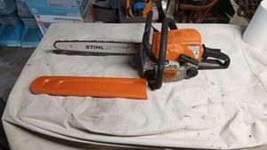 Stihl MS 170 chainsaw with chain guard