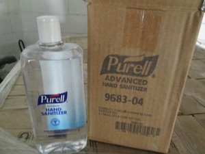 4 33.8 Oz Purell hand sanitizer gel bottles