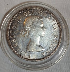 1958 Canada Silver Dollar  British Columbia Totem Pole Centennial Commemorative