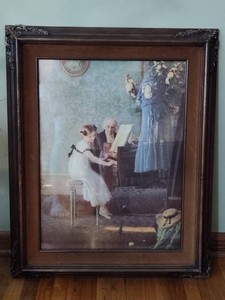 The First Piano Lesson by Jules Alexis Muenier Framed Print