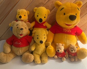 Lot of Vintage Winnie the Pooh Plush Sears and Other Makers