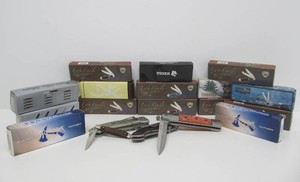 Large Group of New in Box Assorted Folding Knives etc