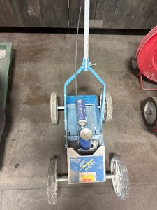 Striper on wheels with couple cans