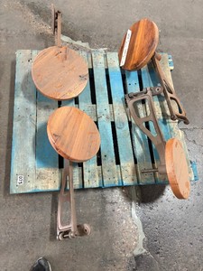 Fixed barstools with wooden seat and swing movement