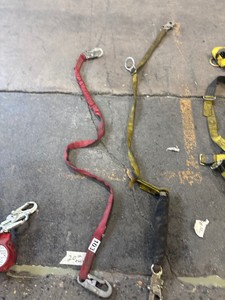 Shock absorption fall protection lanyards