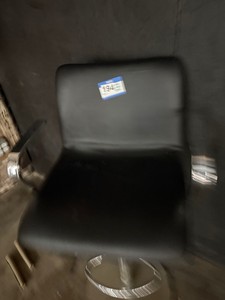 Barstool with armrest