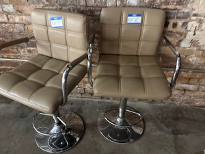 Pair of padded barstool with armrest