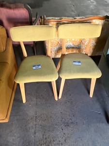 Cushioned wooden chairs