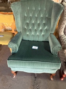 Armchair with carved legs