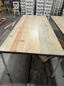 Gray table with metal posts