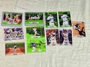Lot of 11 Baseball Cards Featuring Various Players Including Mike Trout, Kyle Manzardo, and Rookies. Includes Lime Green Parallels and Rookie  Cards