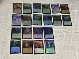 Lot of 20 Magic The Gathering Foil Cards Featuring Various Creatures and Spells