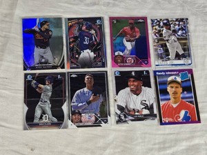 Lot of 8 Baseball Rookie Cards Featuring Fernando Tatis Jr., Randy Johnson, Luis Robert, and Others