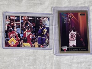 Lot of 2 Michael Jordan Basketball Cards Including 1990 SkyBox and 1990 NBA Hoops League Leaders Scoring Card wWilkins and Malone