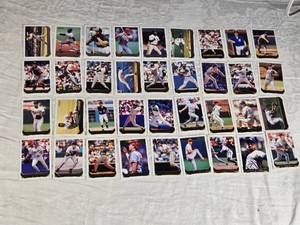 Lot of 36 1993 Topps Gold Baseball Cards featuring players like Ron Gant, including notable teams like Yankees and Braves.