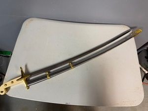 USMC Officers Mameluke Sword Featuring Curved Steel Blade, Ivory-Colored Grip, Gold Plated Brass Cross Guard and a Matching Metal Scabbard with Ornate Brass Mounts (36 Overall)