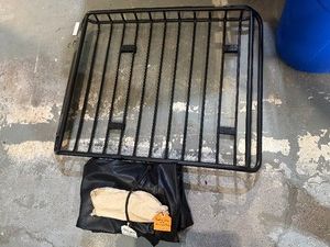 Car-Top Luggage CarrierRack 3 Wide x 4 Long x 4 Deep. Includes all mounting hardware and zipperedvelcroed waterproof cargo bag.
