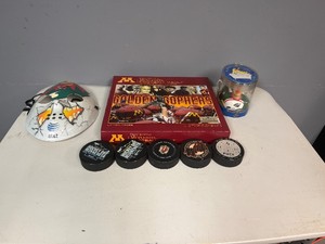 Collectible MN Wild Pucks, Mask and MN Gopher Football Vault Book