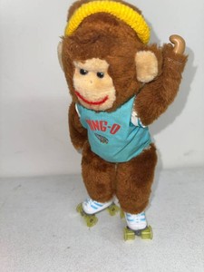 Vintage Ring-O Roller Skating Monkey Battery Operated Plush Toy