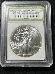 2012 AMERICAN SILVER EAGLE 1 TROY OZ .999 FINE SILVER BU SLABBED