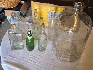 Glass Bottle Collection including Carboy, Grolsch Bottle, and Decorative Bottles