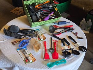 Assorted Kitchen Utensils including Spatulas, Ladles, Whisks, and More