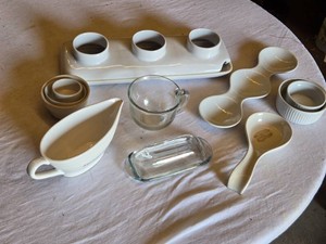 Various Kitchenware Items including Serving Dishes, Measuring Cup, and Ramekins