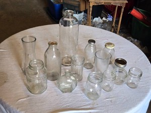 Lot of Glass Jars and Containers Including Atlas Mason Jar, Shake Well Jar, and More
