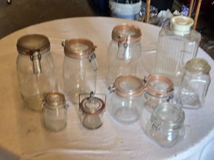 Glass storage jars including Fido models, various sizes, and designs
