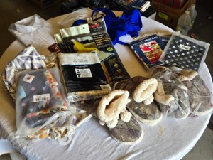 Assorted Household Items Insulated Slippers, Flags, Tablecloths, and More