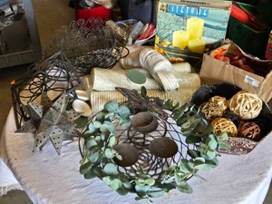 Home decor items including LiteTyme Candle Garden set, decorative metal spheres, coasters, and rattan balls