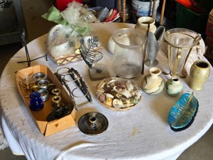 Various Decorative and Household Items Including Shells and Candleholders
