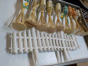 White Plastic Fence and Bamboo Tabl...