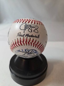 Autographed baseball from Chicago White Sox Circa 2005-2009 with display. No COA.  Includes autographs of Jose Contrers, Bobby Jenks, Mark Buehrles and more. NO COA
