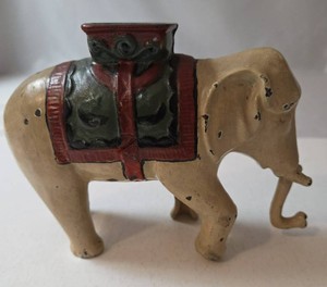 Antique Circus Elephant Cast Iron Still Bank. 5 tall x 6 wide).  Circa - 1920s-1930s)