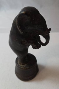 Antique cast iron circus elephant standing on tub coin bank. 5 tall.   Circa-1920s-1930s)