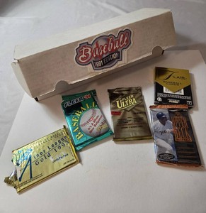 Box of 1991 Edition Upper Deck Baseball Cards and  5 misc. card packs. Card count not verified or gone through by American Auctions.