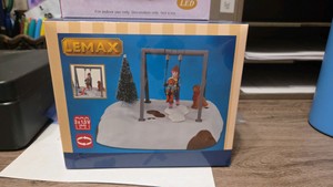 Lemax Puppy Gets a Swing Ride