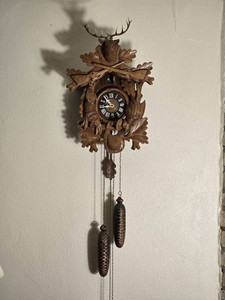 German Black Forest Style Cuckoo Clock with Deer and Rifle Carving