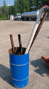 BLUE CAN FULL OF MISC METAL PIPES
