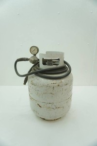 Portable Propane Cylinder With a pressure gauge and regulator hose