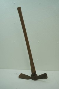 vintage mattock or grub ax