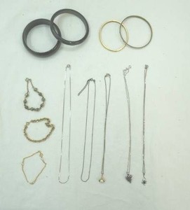 variety of silversilver tone necklaces, bracelets one has Mother of Pearl insets