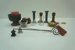group of candles and candle holders