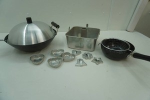 vintage cookie cutters, square cake pan, wok, sauce pan and strainer