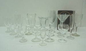 large variety of stemmed glassware